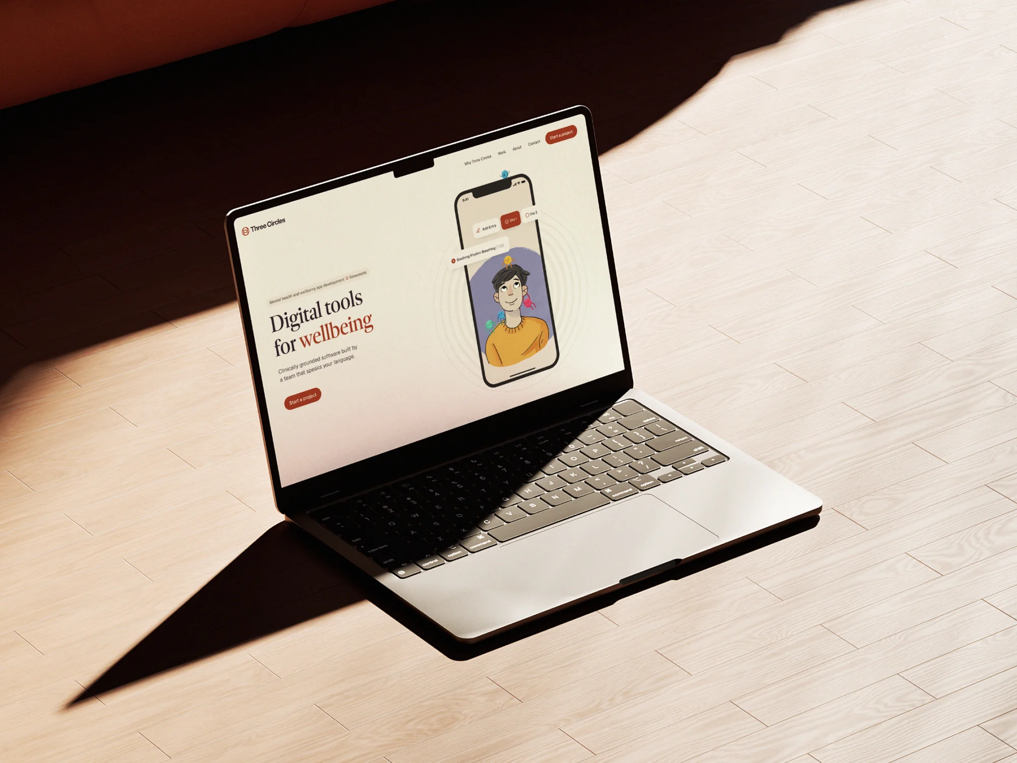 Three Circles website on a laptop.